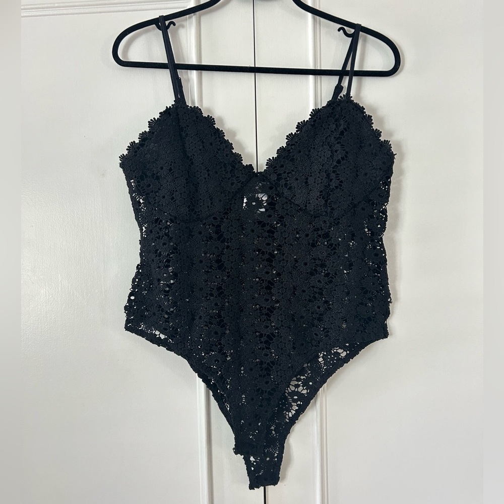Flower detailed black see through bodysuit. Size large.